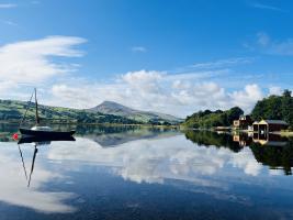 Level grass pitches at Glanllyn caravan & camping park
