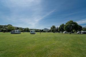 Touring Caravans and Campervans - Level grass area for caravans